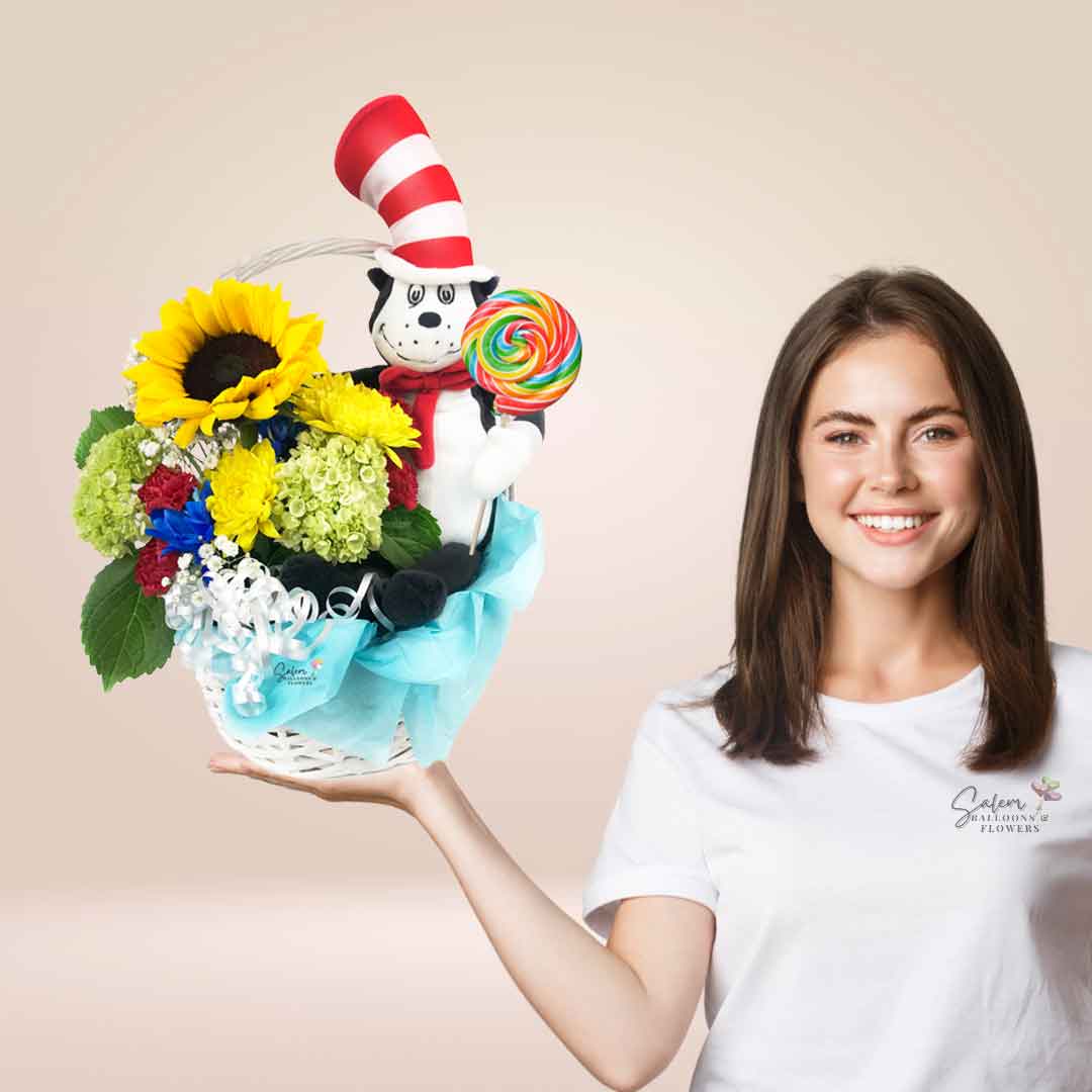 A young girl holding a Dr.Seuss themed flower basket.  Flower delivery Salem Oregon