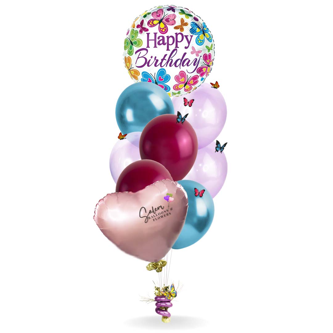 Helium balloon bouquet. Featuring a Happy Birthday Mylar balloon with butterflies. Balloon delivery in Salem Oregon