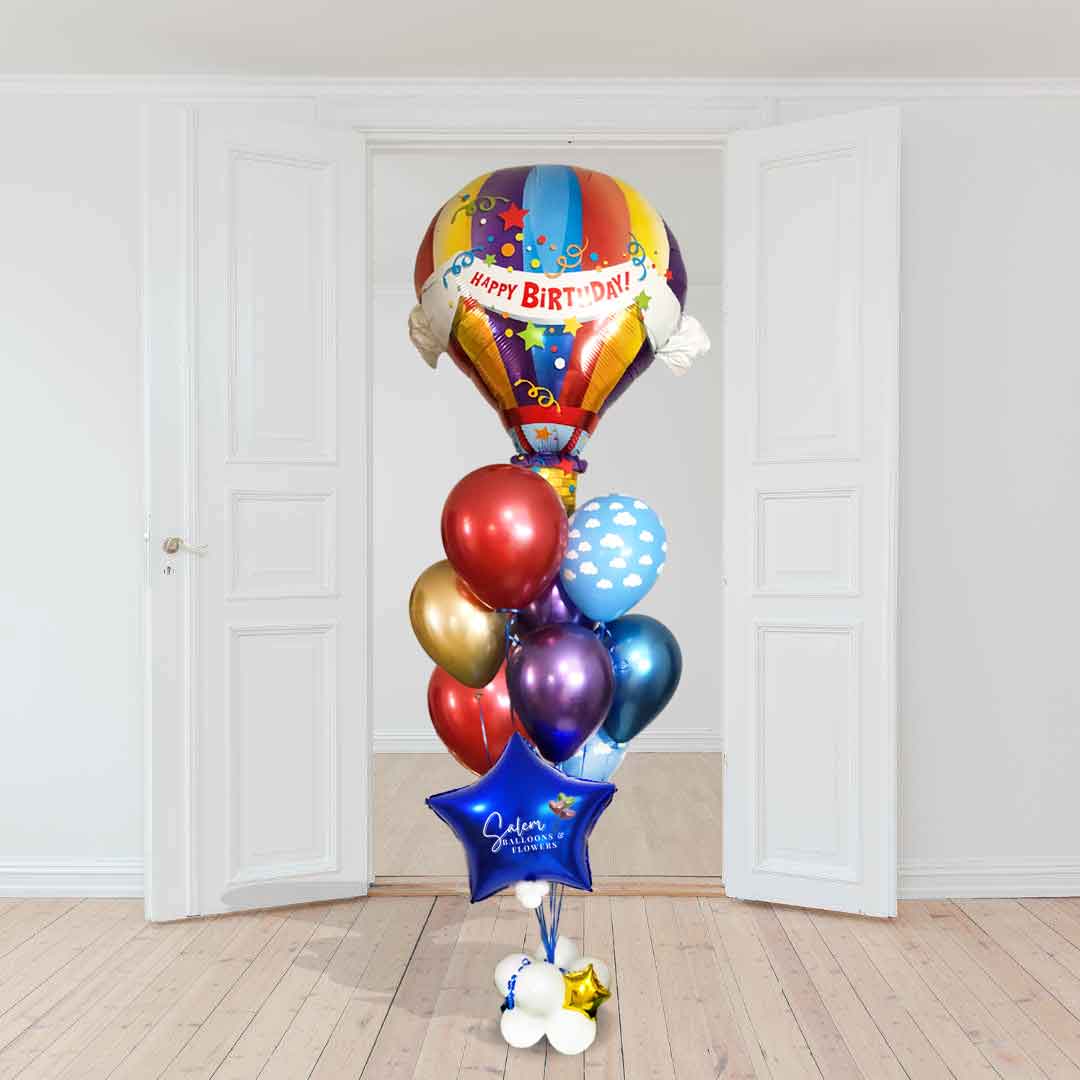 Birthday balloon delivery in Salem Oregon and nearby cities. Celebrate in style with our exquisite HBD Hot Air Classic Balloon Bouquet. Designed with your special occasion in mind, this exquisite bouquet features an extra large Hot Air Balloon, with a magical array of Chrome balloons, all anchored to a cloud decorated with golden stars and lots of ribbon. Size chart. approx 6ft tall.
