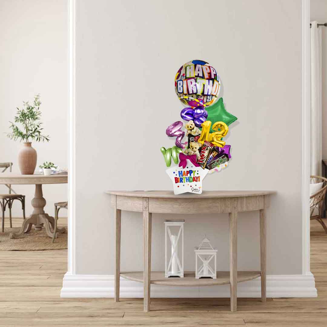 Gorgeous Birthday gift. A ceramic star vase filled with a delicious assortment of Chocolates, colorful Happy Birthday Balloons, The cutest mini Teddy Bears and balloon numbers! Delivery Balloons Salem Oregon and nearby cities.