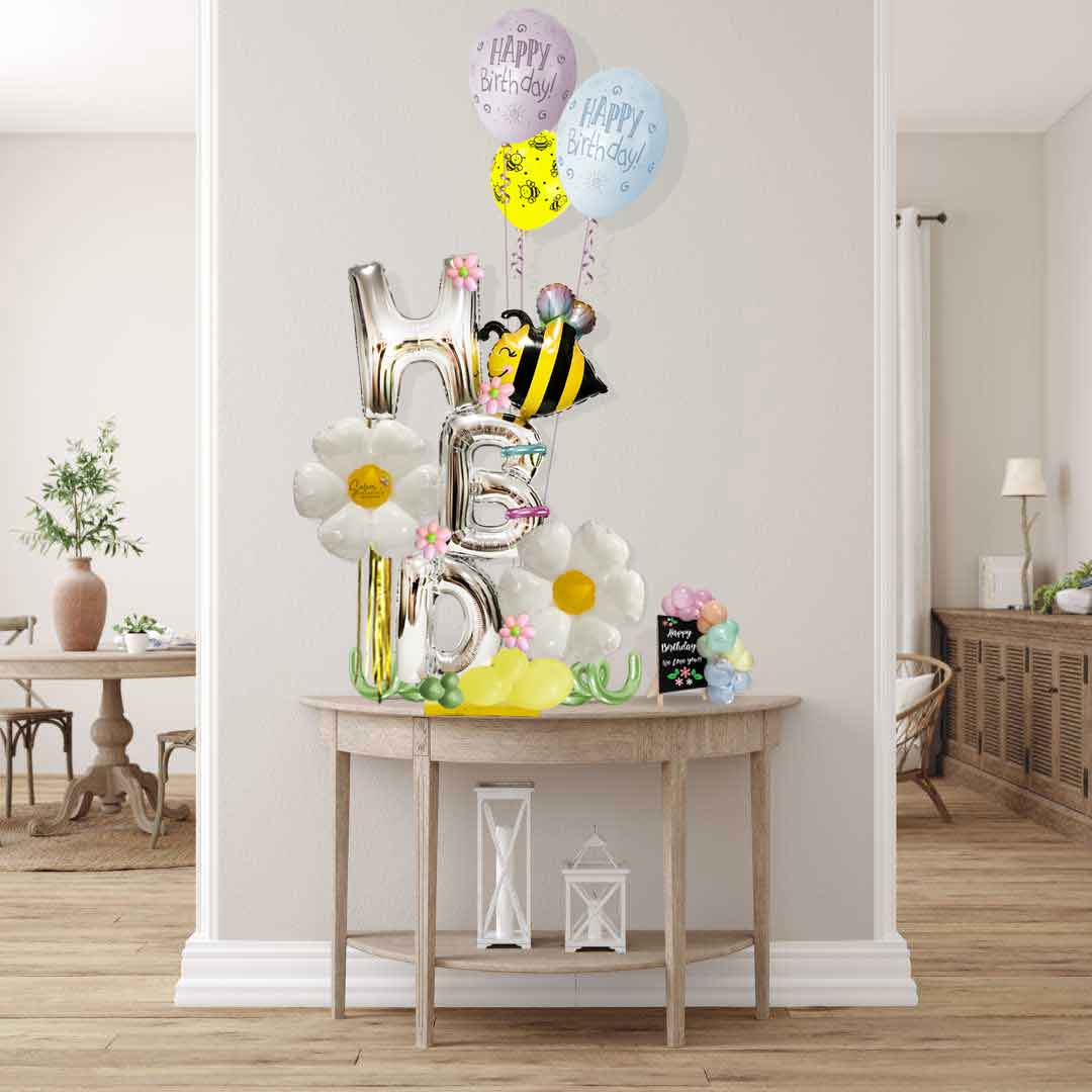 HBD balloon bouquet featuring the cutest bee, daisy flowers and H, B and D balloon letters and a set of helium balloons. Balloon delivery Salem Oregon and nearby cities. Size chart.