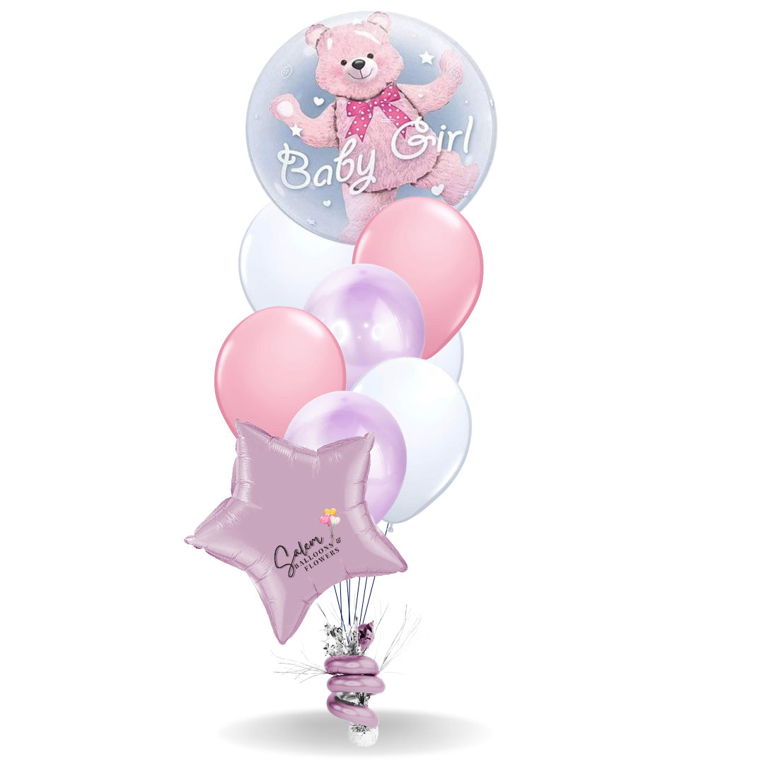 Baby Girl helium classic balloon bouquet. Featuring an extra large stuffed bubble balloon with a teddy bear balloon, and a set of matching colors helium balloons, anchored to a decorated weight. Delivery in Salem Oregon and nearby areas. 