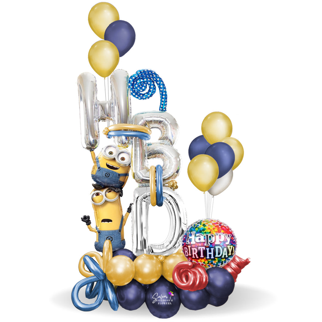 Extra large birthday balloon bouquet. Featuring an oversize Minions balloon with 2 characters holding large HBD balloon letters while standing on a whimsical balloon base. Delivery Salem Oregon and nearby cities.