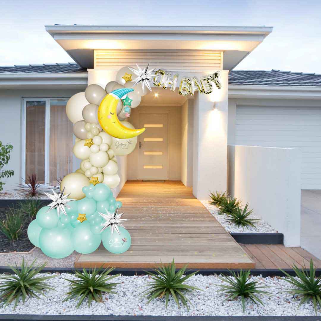pastel colors balloon garland with a moon in pyjamas for a baby shower. Salem Oregon balloon decor. 