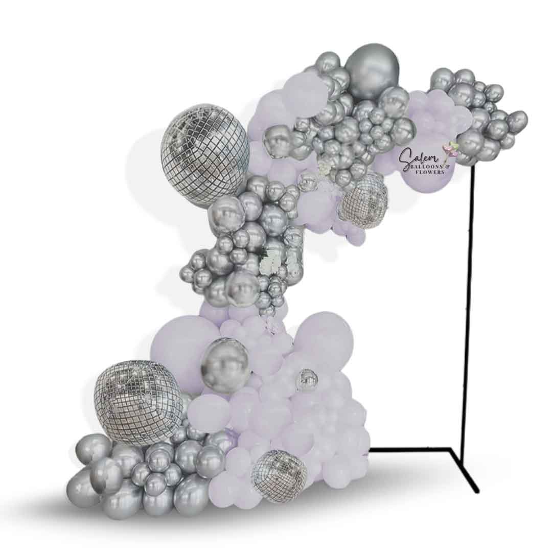 Disco Ball themed organic Balloon Garland on a metal frame. In a pastel lavender and silver color palette. Balloon Decor Oregon.