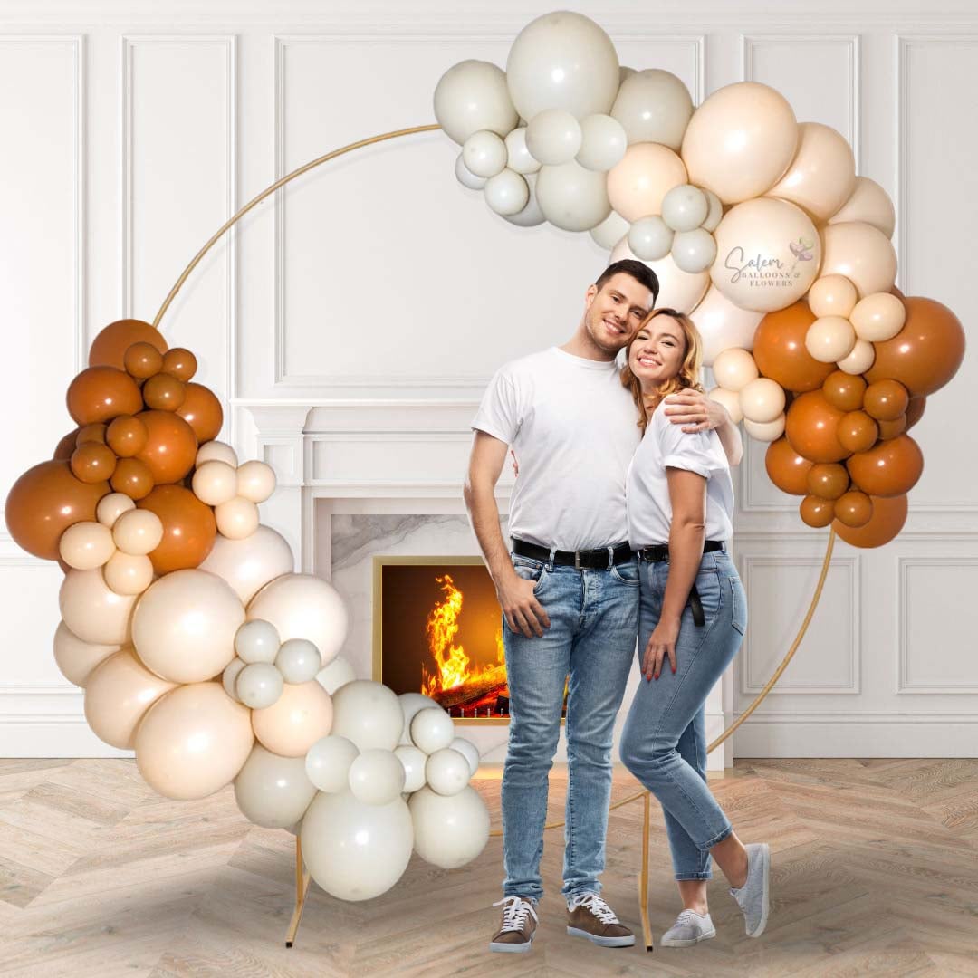 Balloon hoop. Balloon garland in a golden hoop frame in pink, white and blush. Salem Oregon Balloon decor.