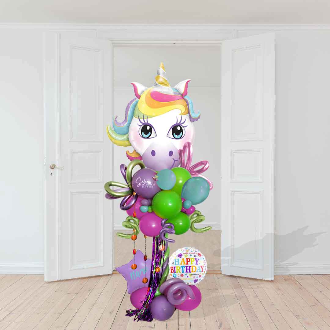 Unicorn themed balloon column decorated in pastel colors. Salem Oregon balloon decorations