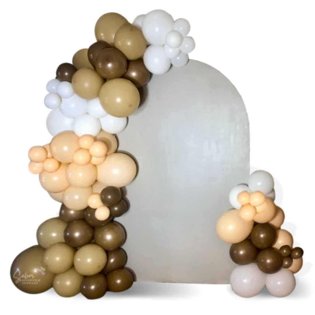 2 Organic balloon garlands in brown, beige, blush and white decorating a single arch panel for Balloon decor. Oregon Balloon Decor.