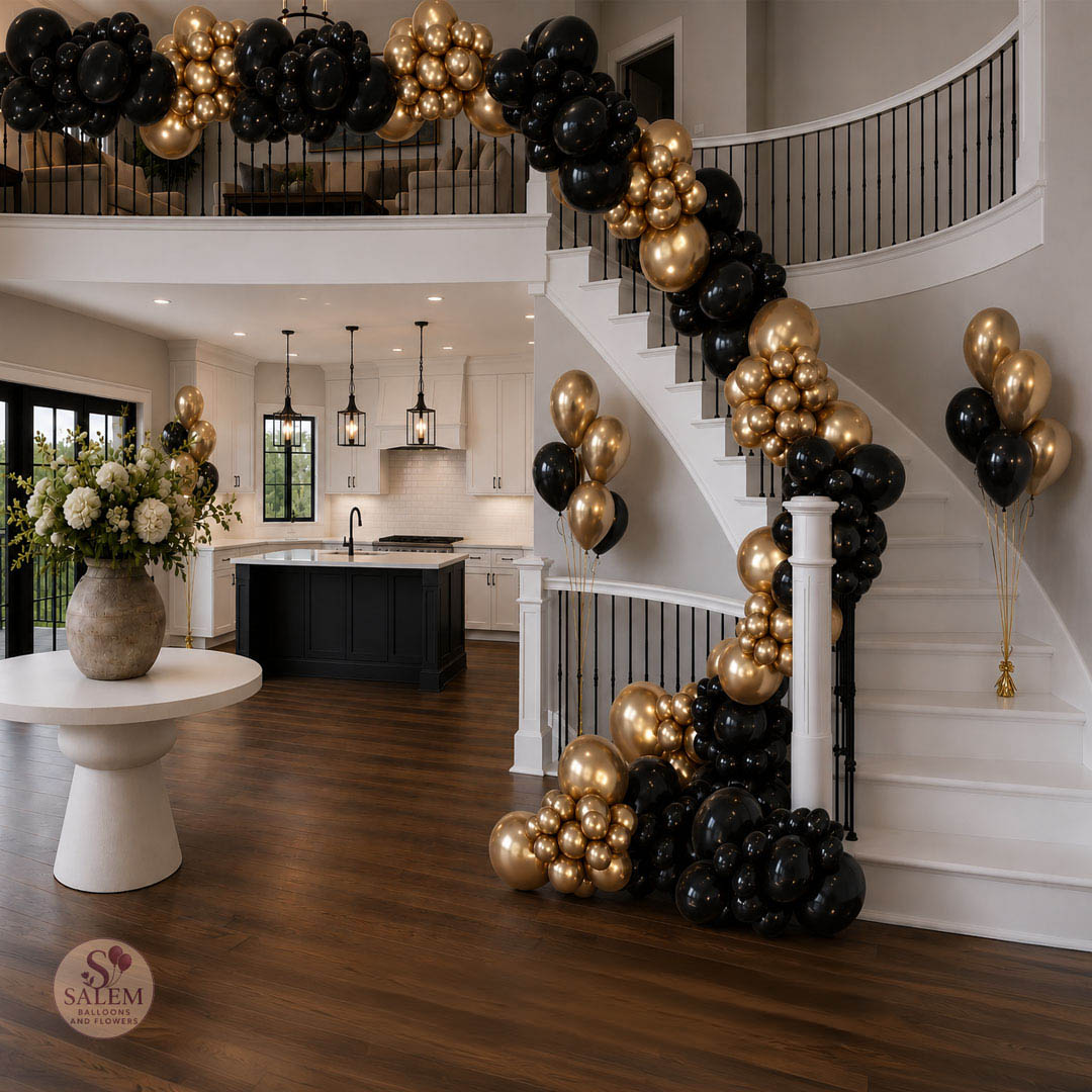 Decorative balloon arch garland in a home interior handrail with black and gold balloons. Balloon Decor. Oregon.