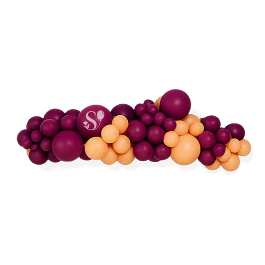 Balloon garland  with purple and orange balloons on a white background. Oregon balloon decorations.