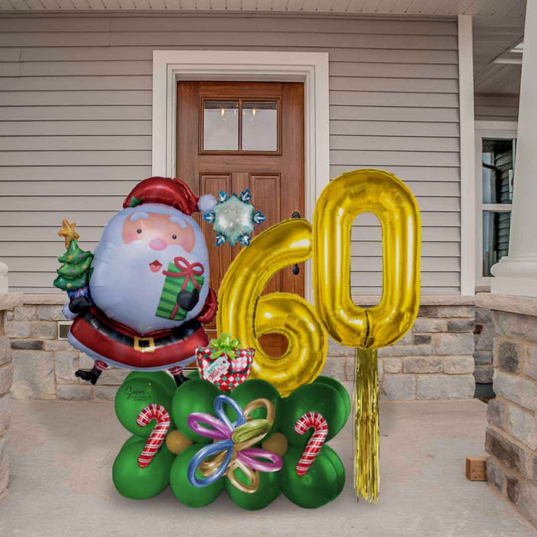 Santa Claus number balloon bouquet. Featuring gold balloon numbers and a happy santa balloon. Oregon Balloon delivery