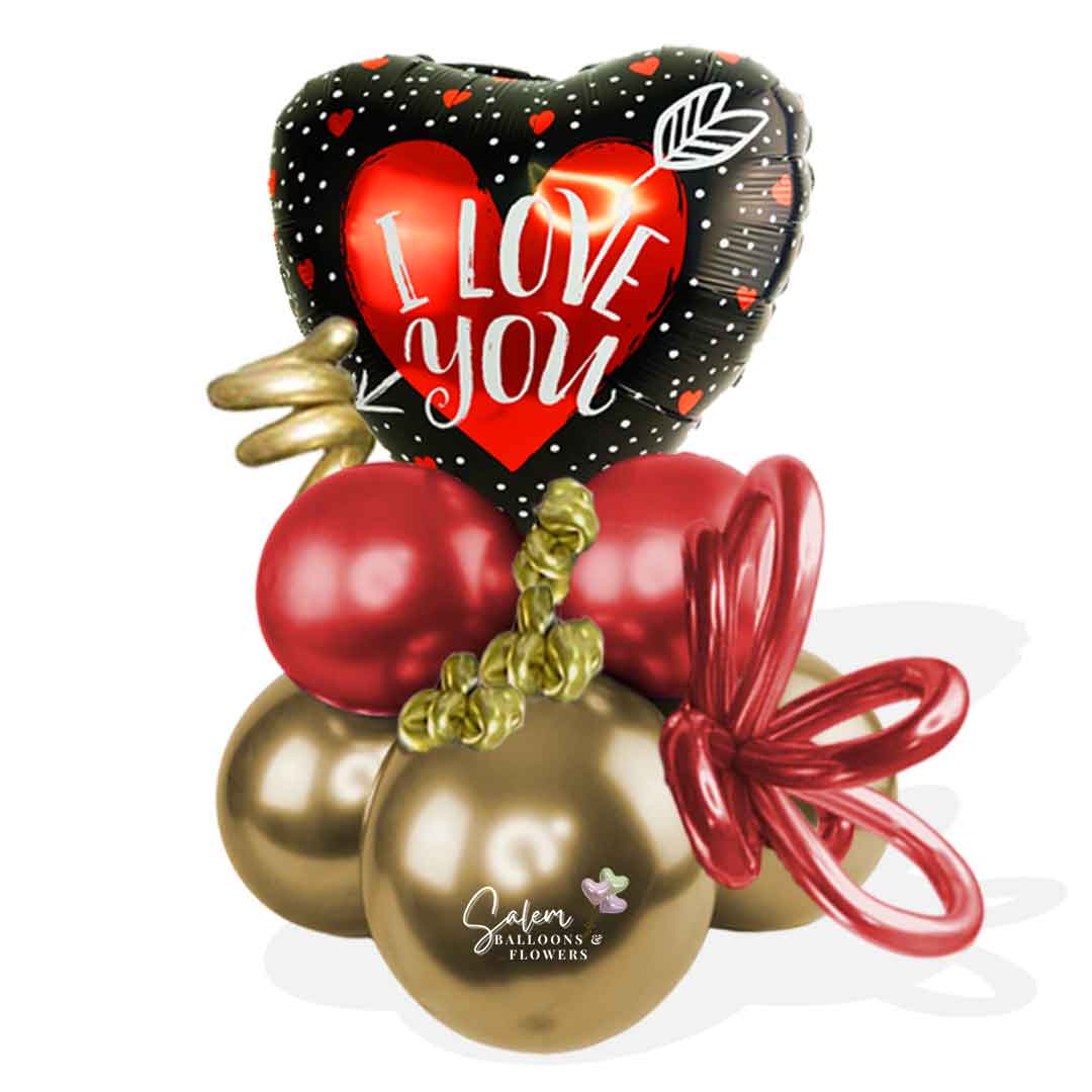 Balloon bouquet featuring a heart-shaped balloon with an 