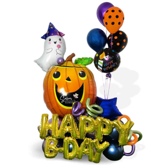 Halloween themed birthday balloon bouquet, with a pumpkin head and a cute ghost balloon and a happy birthday message. Oregon 
Balloon delivery