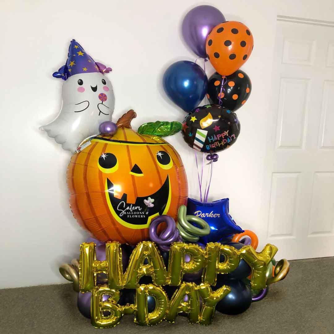 Halloween themed Birthday Balloon Bouquet. With a XL pumpkin balloon and a cute ghost. Balloon delivery Salem Oregon.