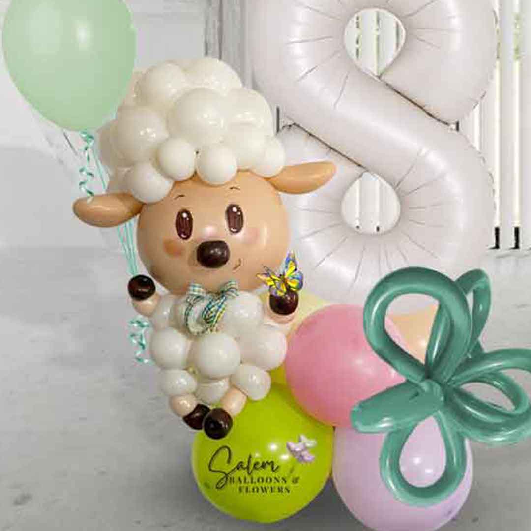 Balloon Lamb sculpture decorating a number balloon bouquet in pastel colors. Oregon balloon Delivery.