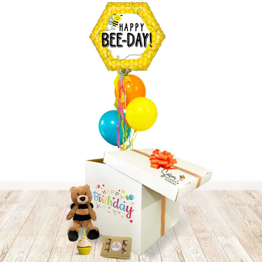 Surprise Balloon Box birthday gift. Lift the lid and let the happiness fly! A magical Happy Birthday helium balloon floats up as it reveals a cuddly musical plushy that plays a festive Happy Birthday tune and a box of delicious chocolates. Balloons Salem Oregon