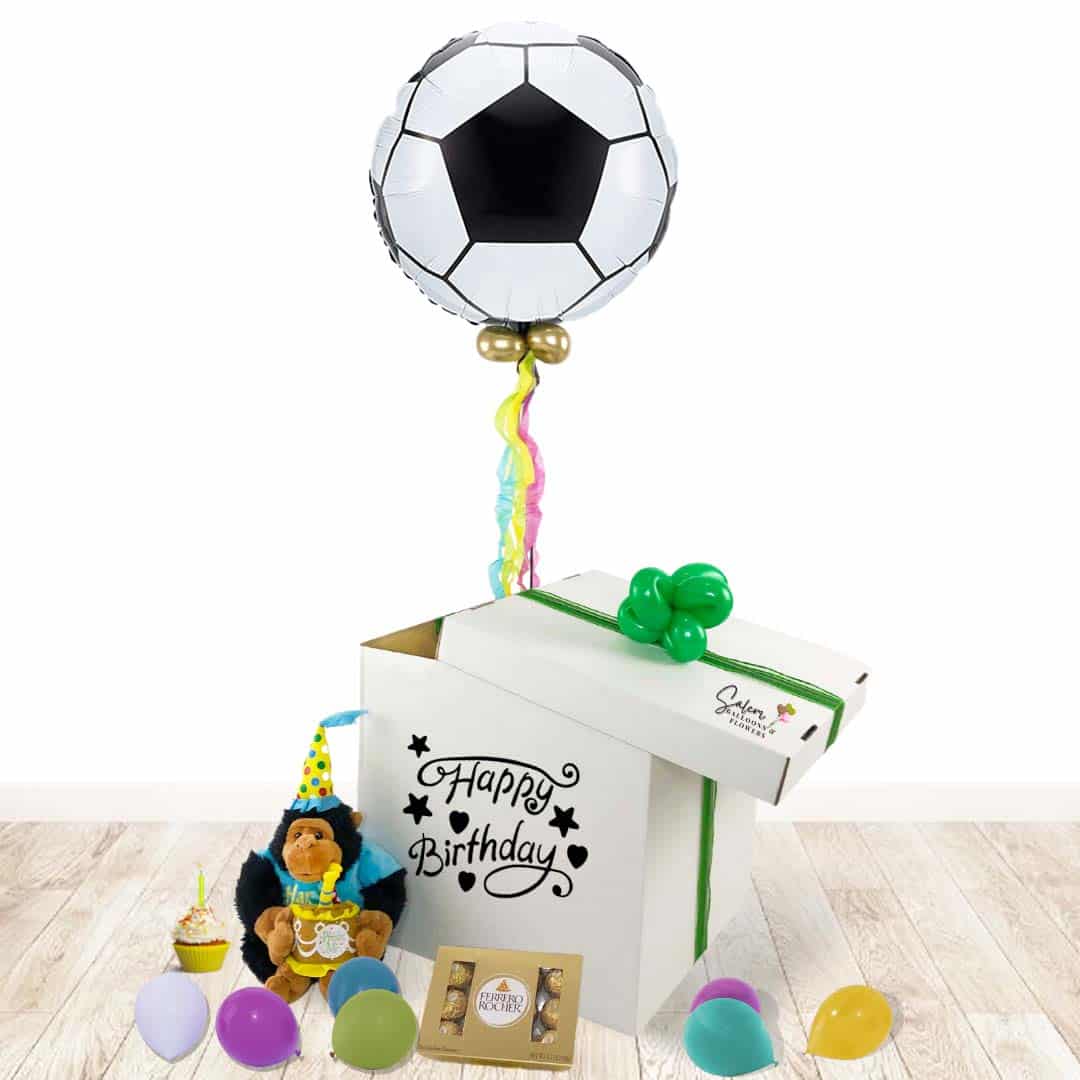 Surprise Balloon Box birthday gift. Lift the lid and let the happiness float up! A magical soccer ball balloon floats up as it reveals a cuddly musical plushy that plays a festive Happy Birthday tune and a box of delicious chocolates. Balloons Salem Oregon