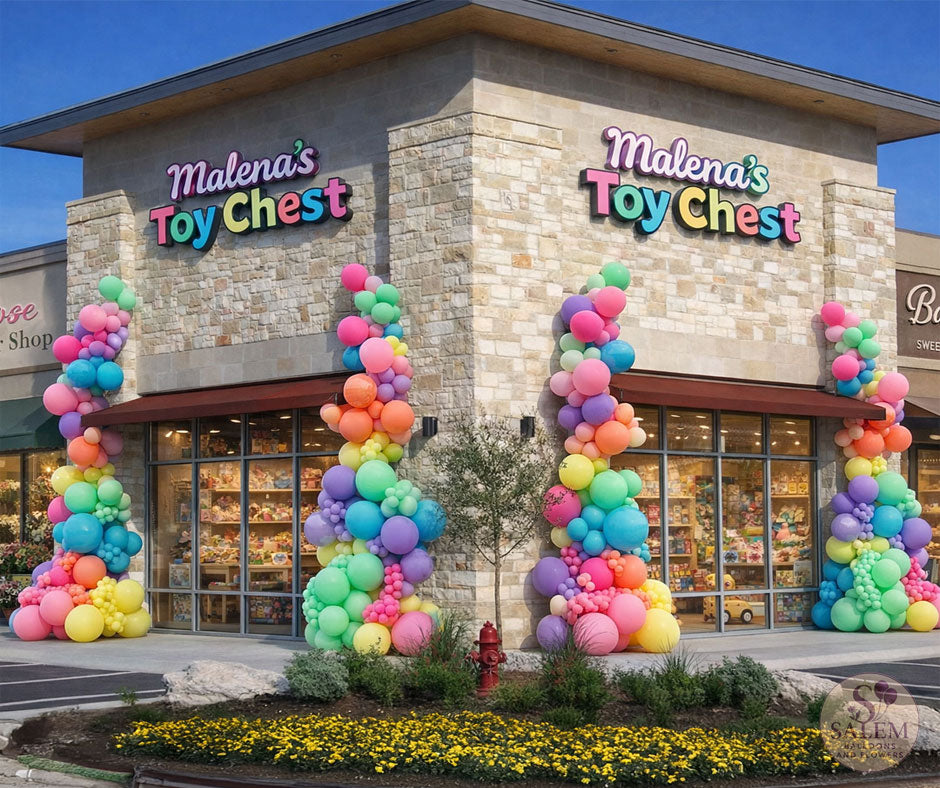 Malena's Toy Chest store front with colorful balloon garlands decorating the storefront. High visual impact storefront balloon decor. Oregon
