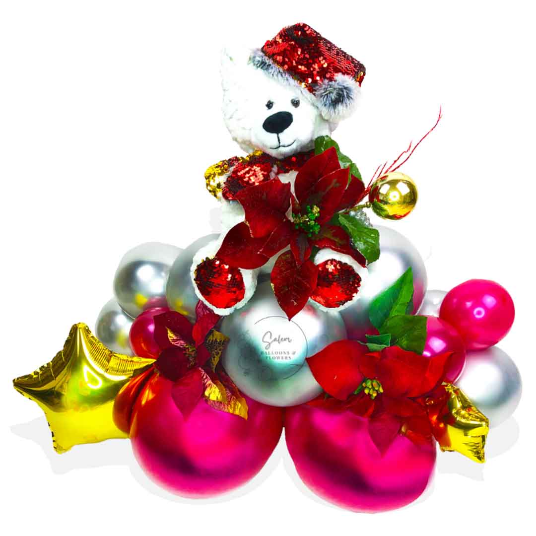 Christmas balloon bouquet with white polar bear plush. Balloons Salem Oregon.