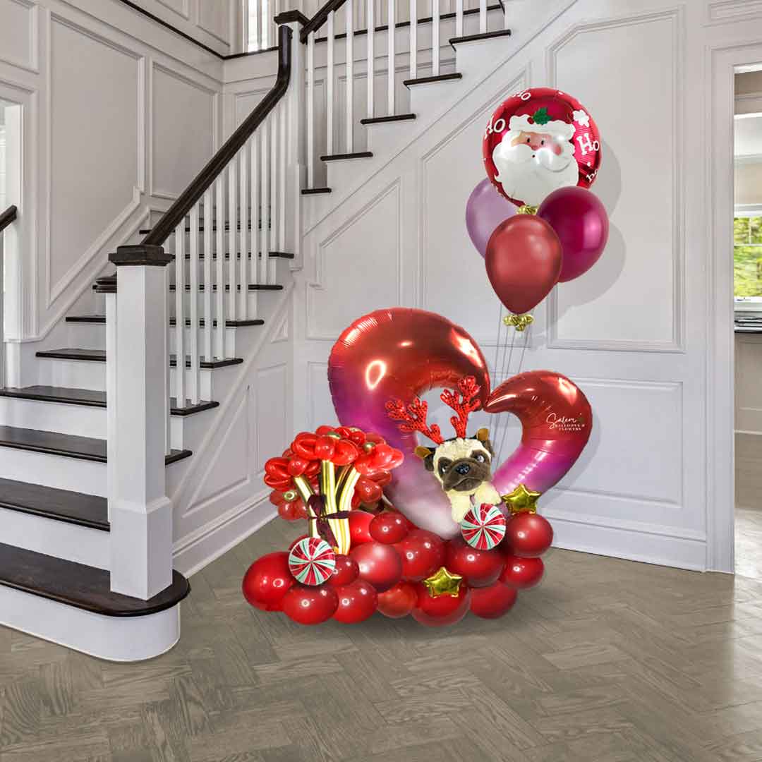 Pug puppy poking through a decadent open heart adorned with peppermint-style balloons and helium balloons. Balloons Salem Oregon. Size chart