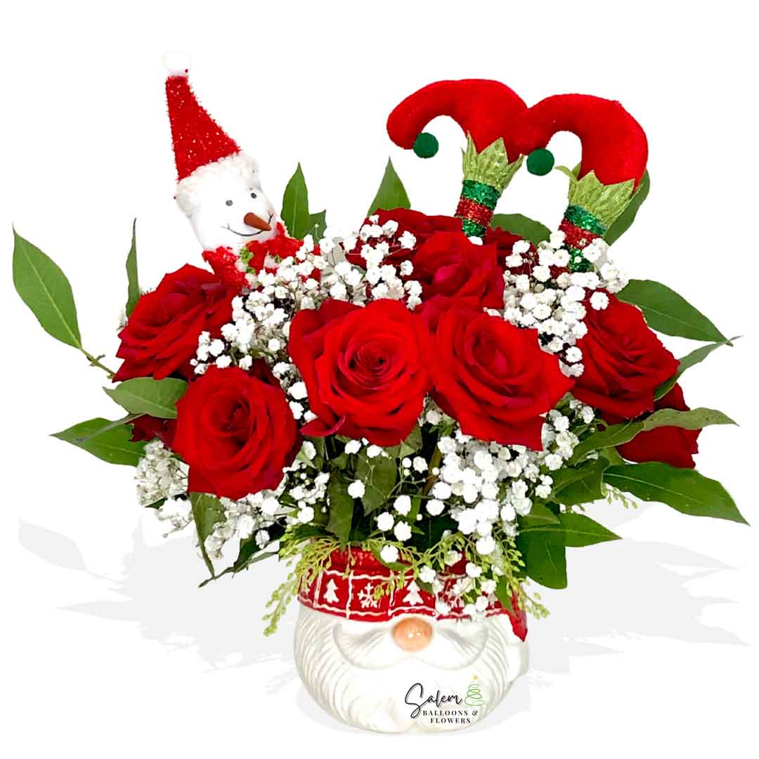 Christmas flowers in a santa ceramic vase. Flower delivery in Salem Oregon