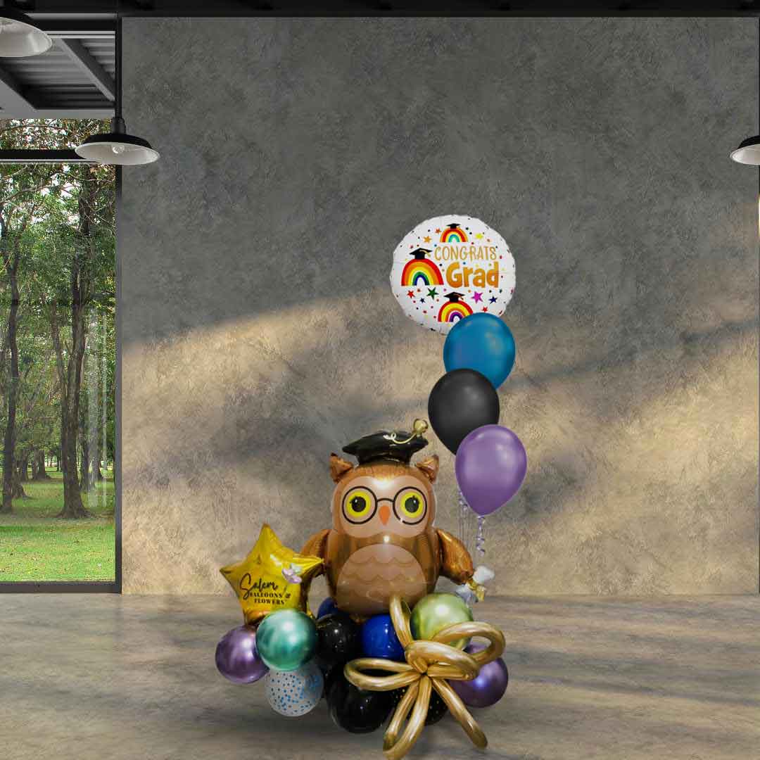 Congrats Grad Balloon Bouquet. Featuring a large Owl balloon in a blue, black and purple color scheme. Balloon Delivery Oregon.