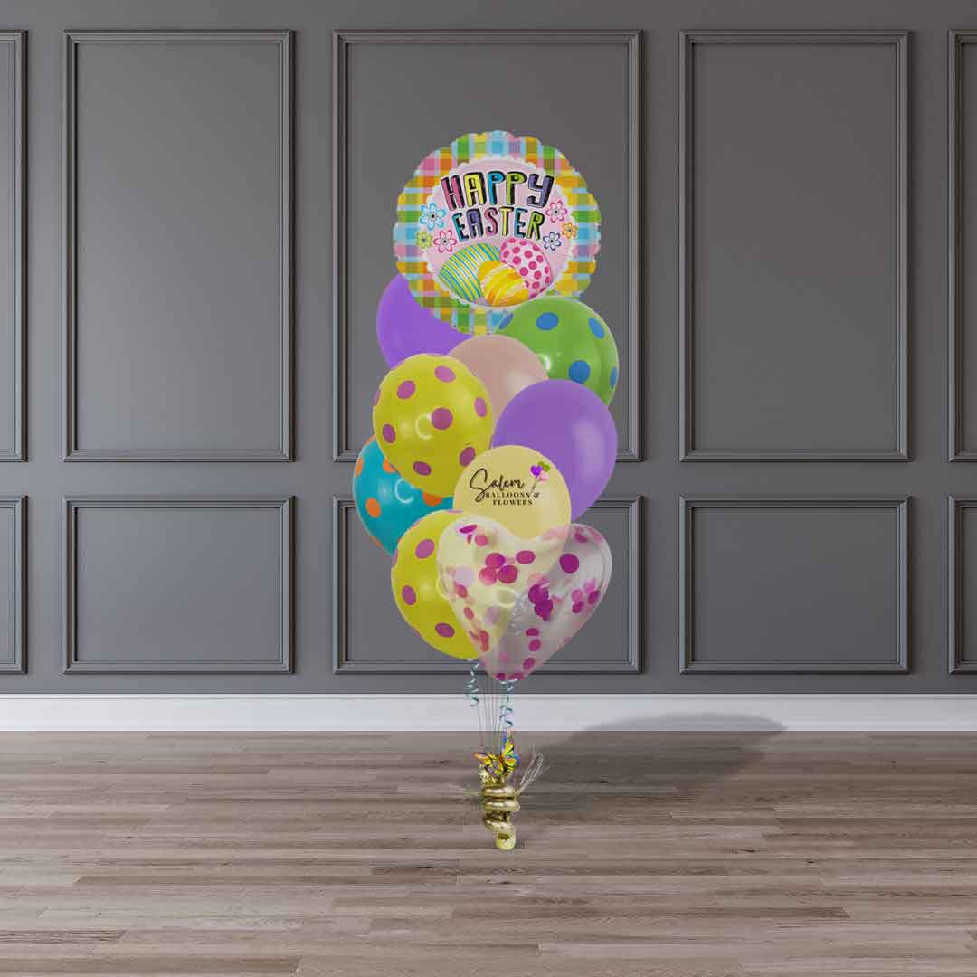 a Happy easter balloon bouquet with polka-dots balloons in vibrant colors standing in front of a wary panel wall. Balloon delivery Salem Oregon