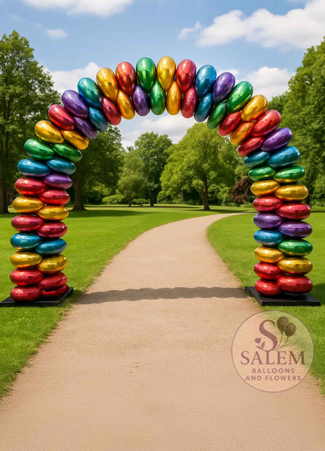 Colorful foil balloon arch in a park. Balloon decor Oregon. 