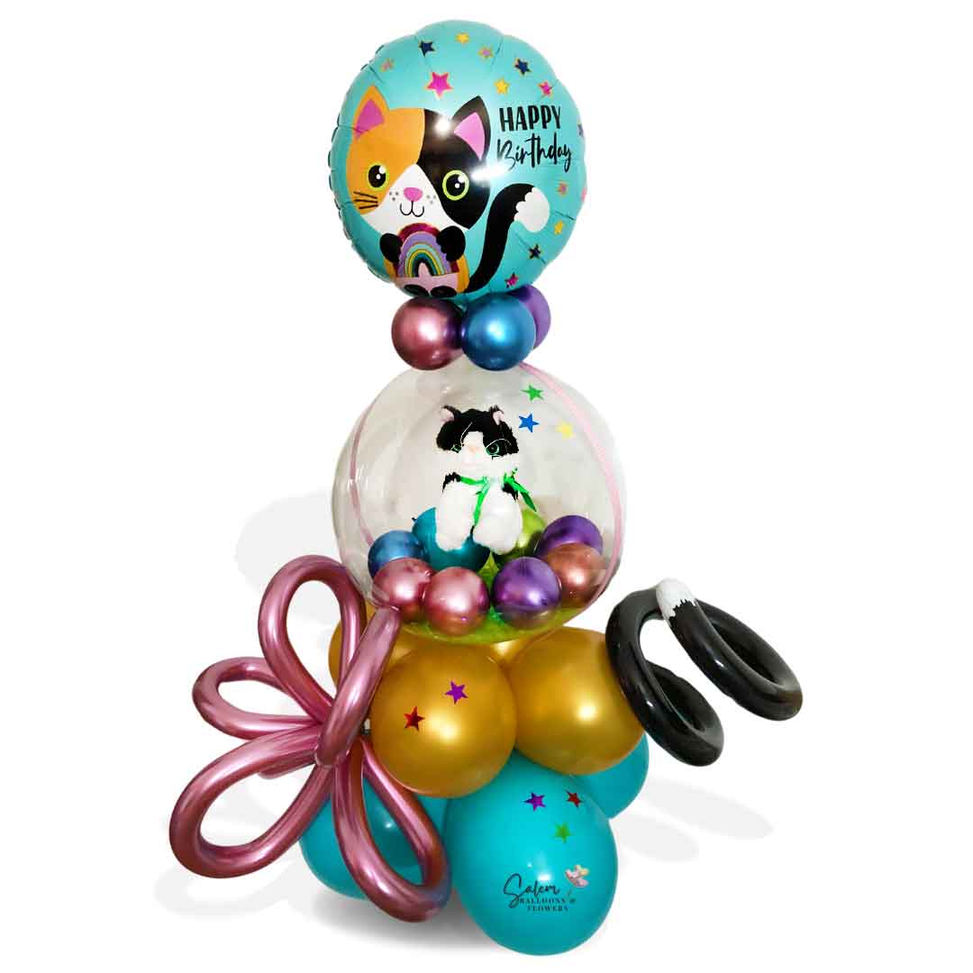 Stuffed bubble balloon arrangement. Featuring a Kitty cat plush stuffed in a bubble balloon and a Mylar balloon with a 