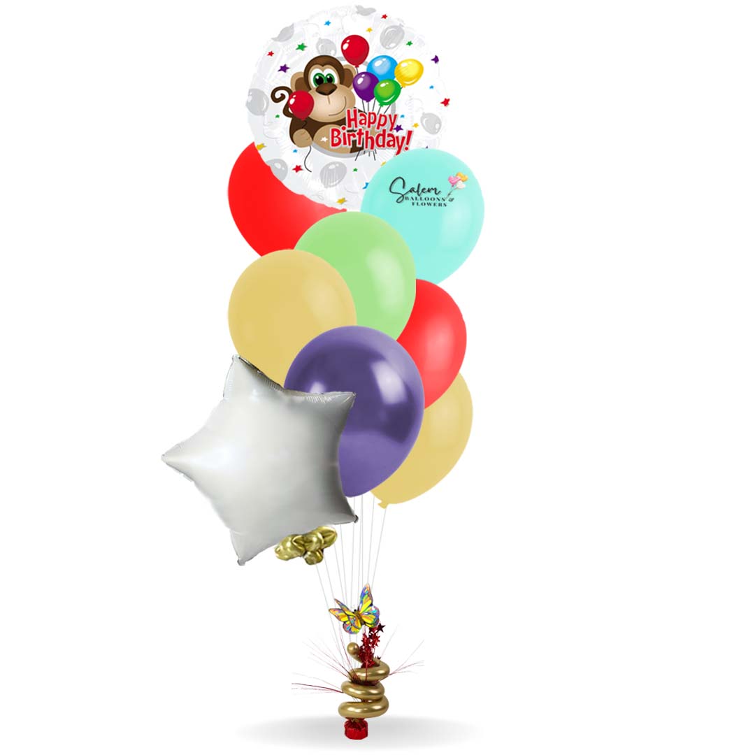 Moneky themed helium balloon bouquet. Birthday balloons featuring a monkey. Salem Oregon balloon delivery.