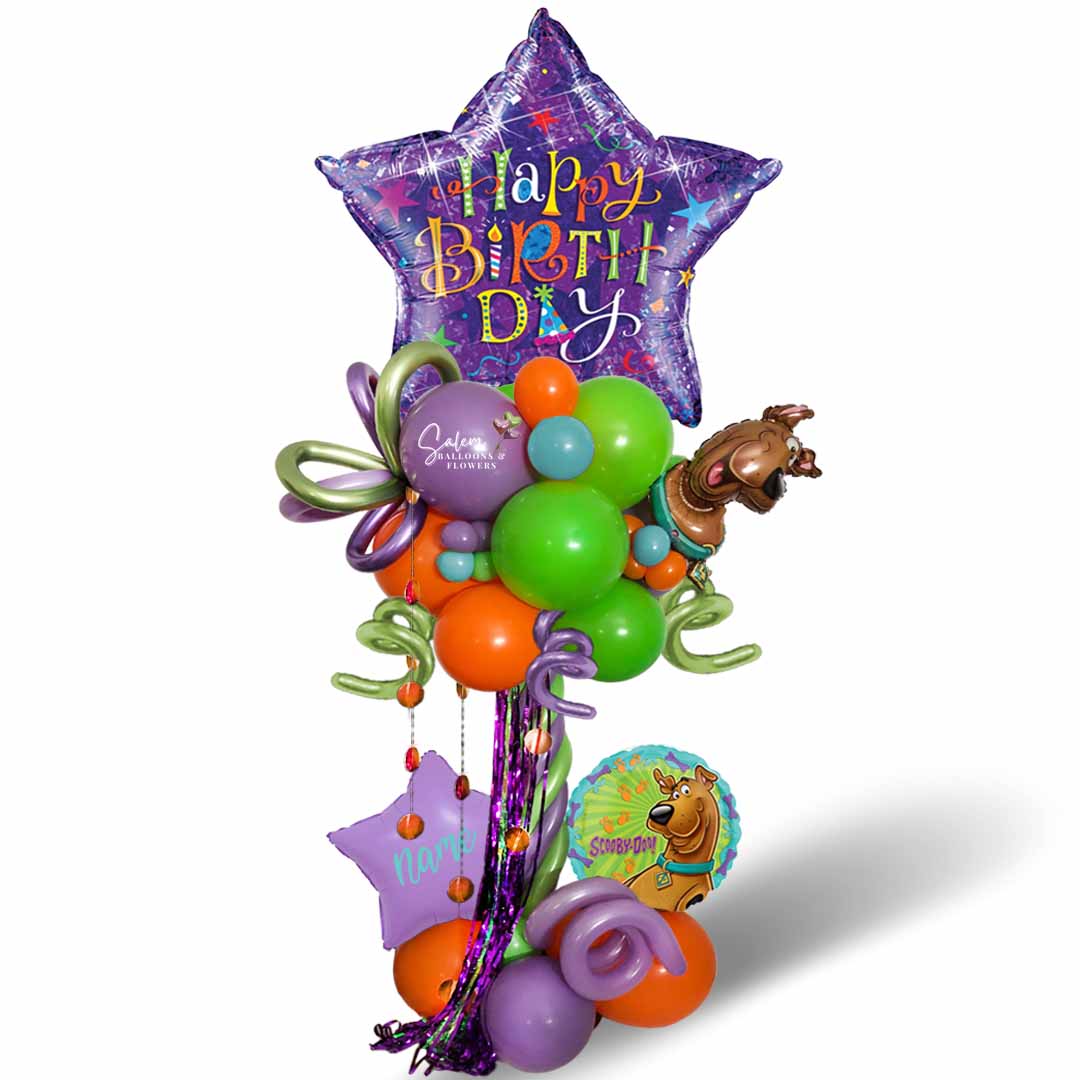 Scooby Doo themed birthday balloon column in purple and orange. Salem Oregon Balloon Decor.