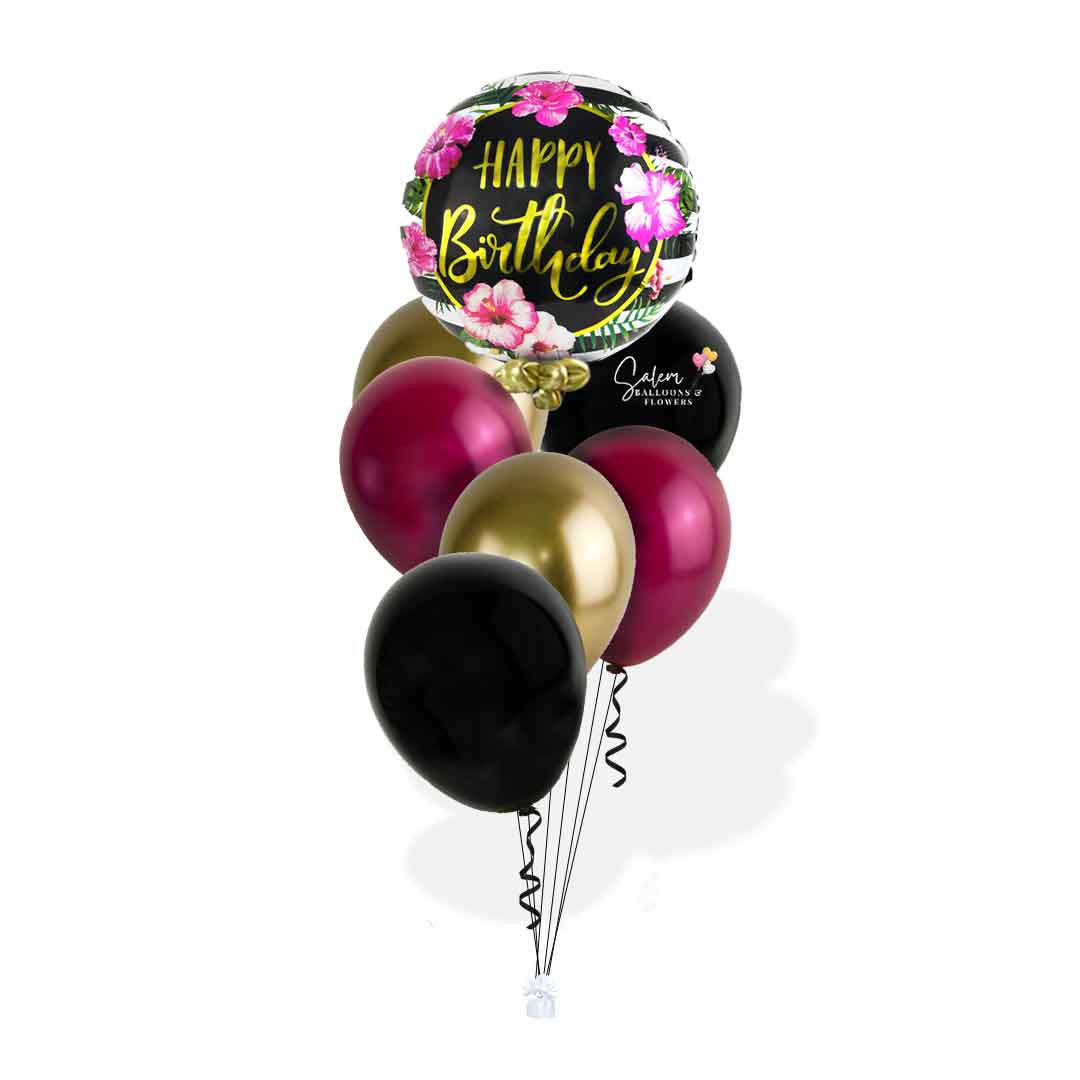 Hawaiian flower themed, Balloon bouquet with a 'Happy Birthday' balloon on a white background. Oregon balloon delivery.