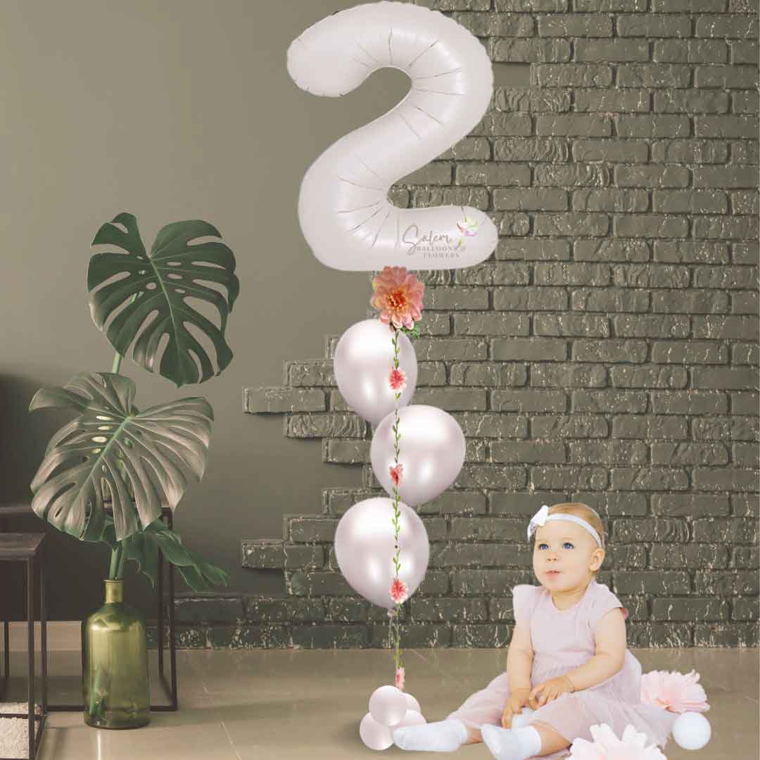One beige helium balloon number anchored to an Ivy ribbon with helium latex balloons. Balloons Salem Oregon. Size chart.