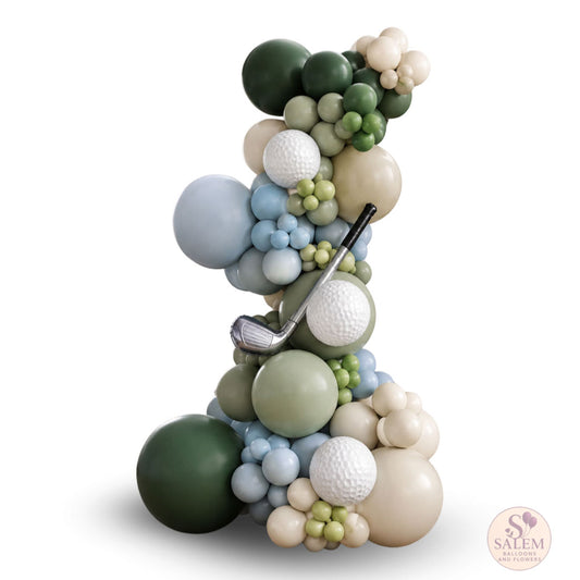 Golf themed balloon garland for a Hole in one themed standing on a white background in a green, cream and light blue color palette. Ideal for baby shower or 1st birthday by Salem Balloons and Flowers