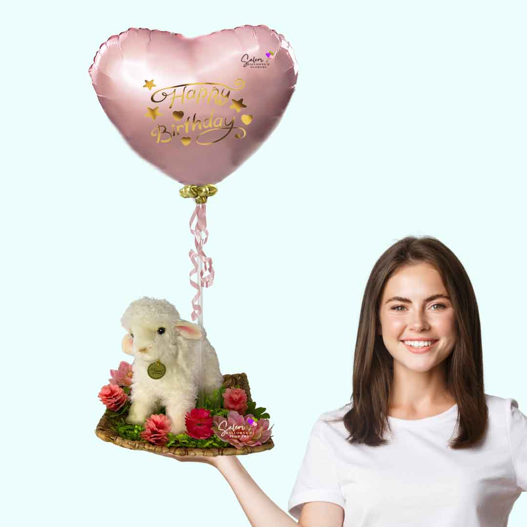 Young girl holding a square basket with flowers a lamb plush and balloons. approx 2.5 Ft tall. Balloon delivery Salem Oregon and nearby cities.