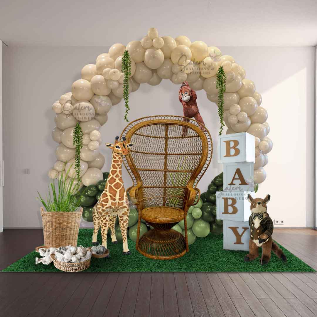 Jungle themed balloon decor.Featuring a tall giraffe, babe cubes, an orangutan, and a fox. Ideal for baby shower or 1st birthday. Balloon Decor. Oregon.