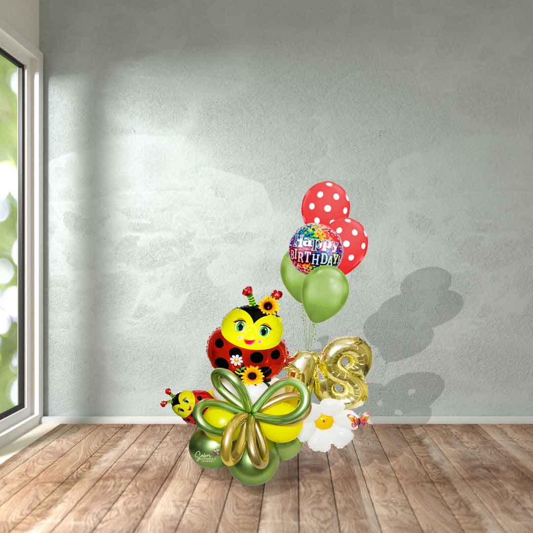 Ladybug-themed balloon bouquet, with an extra set of helium balloons, flowers, balloon numbers, and bugs. Salem Oregon. Balloon delivery