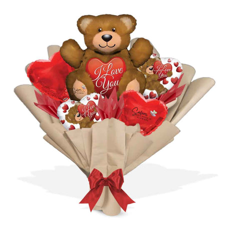 Wrapped balloon bouquet. Featuring a large teddy bear and heart balloons with an " I love you" message. Oregon Balloon delivery.