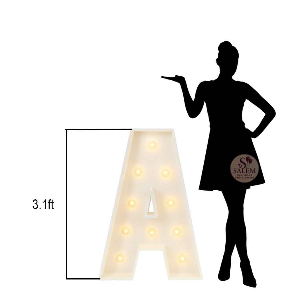 Size chart for a Light-up letter 'A' with a silhouette of a woman and Salem logo on a white background. Marquee is 3.1 ft tall.