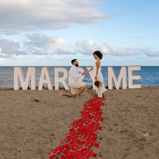 Marquee letter display spelling Marry Me at the beach for a marriage proposal in Neskowin Oregon by Salem Balloons and Flowers.