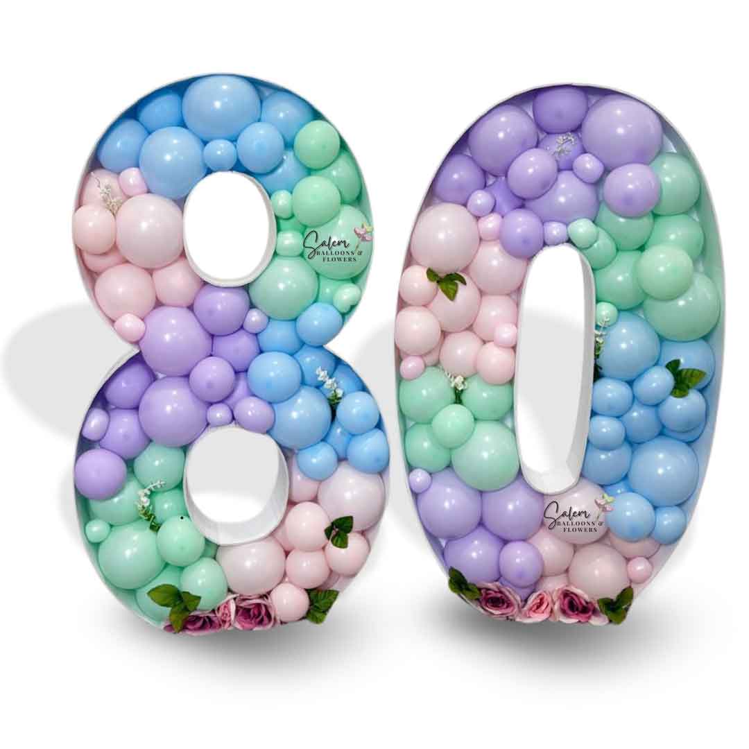Mosaic Balloon number in pastel colors embellished with pink roses. Balloon Decor Oregon