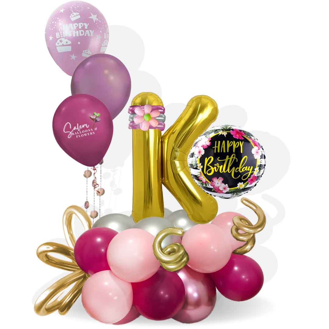 Balloon letter with a happy birthday balloon in a balloon base decorated with ribbon and curly balloons and a set of helium balloons. Balloons Salem Oregon and nearby cities.