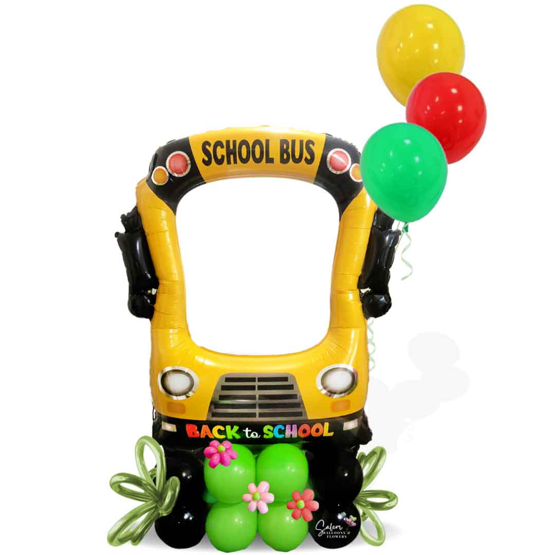Back to School Balloon decor, featuring a 4ft tall school bus balloon photo backdrop. Oregon Balloon Decor.