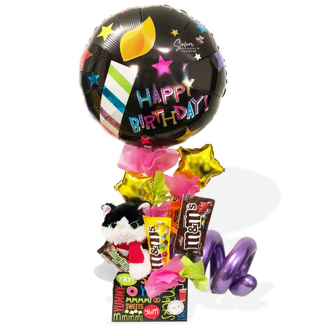 Candy box balloon bouquet with plush and candy and chocolates. Salem Oregon balloon delivery.