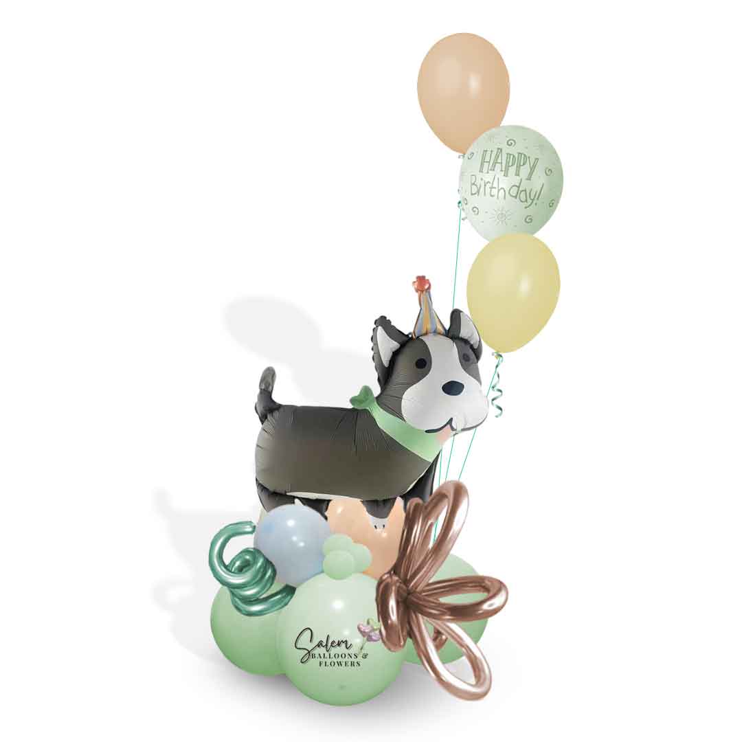 Birthday Balloon Bouquet in pastel colors, featuring a gray dog balloon with white ears and decorated with curly balloons. Oregon Balloon delivery.