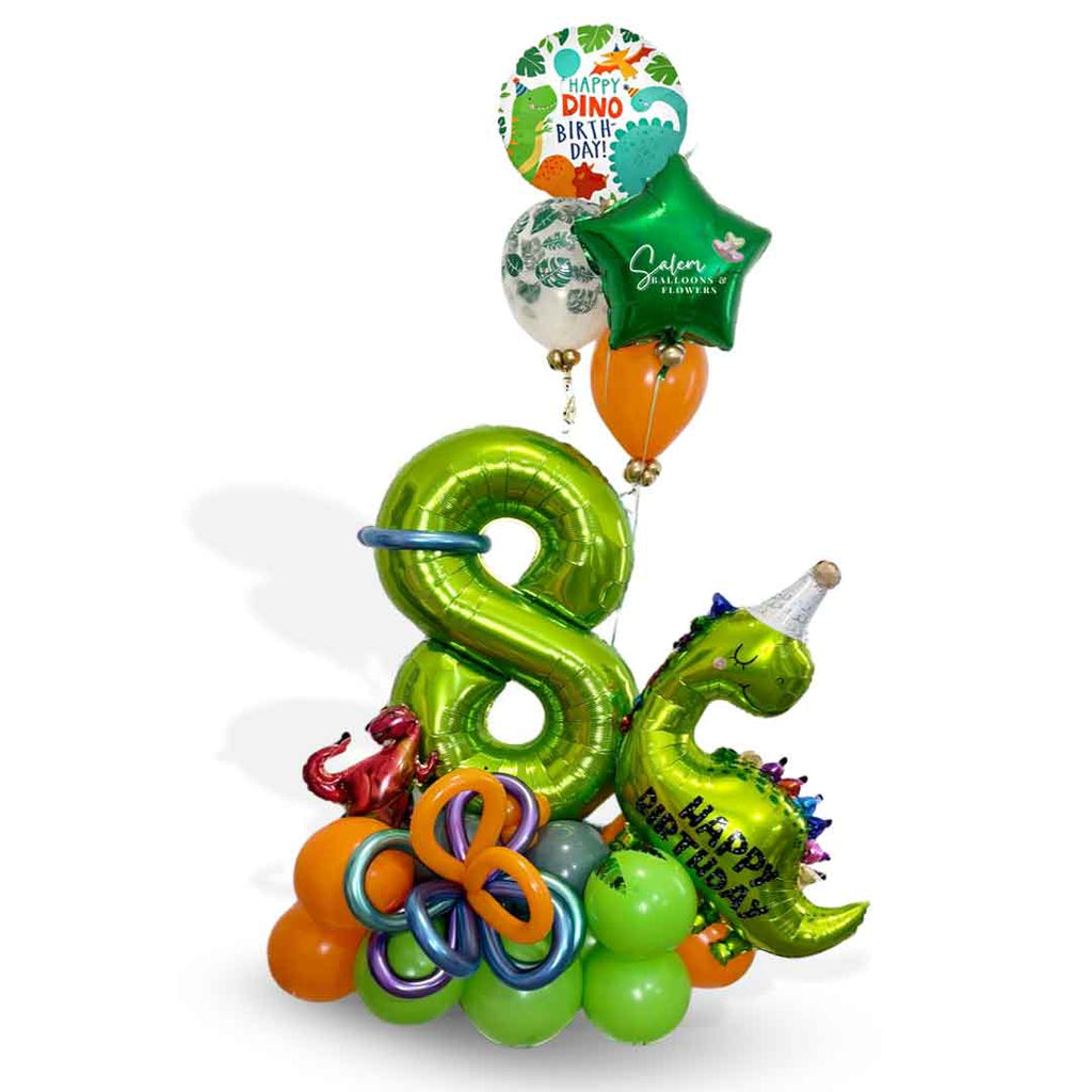 A Dinosaur-themed number balloon bouquet. Featuring Dinosaur shaped balloons, 1 large number balloon and a helium balloon bouquet, standing in front of a door. Approx 7 ft Tall. Oregon Balloon Delivery.
