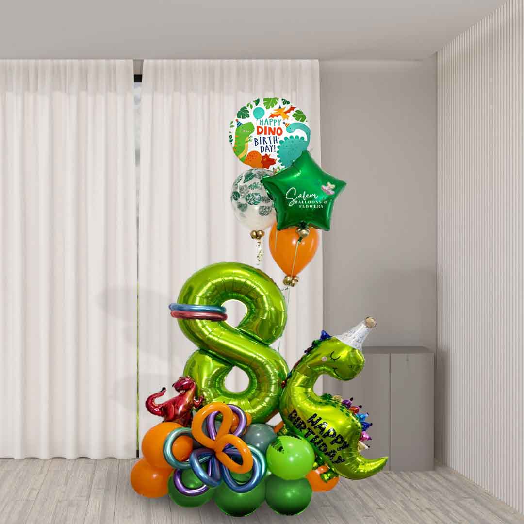 A Dinosaur-themed number balloon bouquet. Featuring Dinosaur shaped balloons, 1 large number balloon and a helium balloon bouquet, standing in front of a door. Approx 7 ft Tall. Oregon Balloon Delivery.