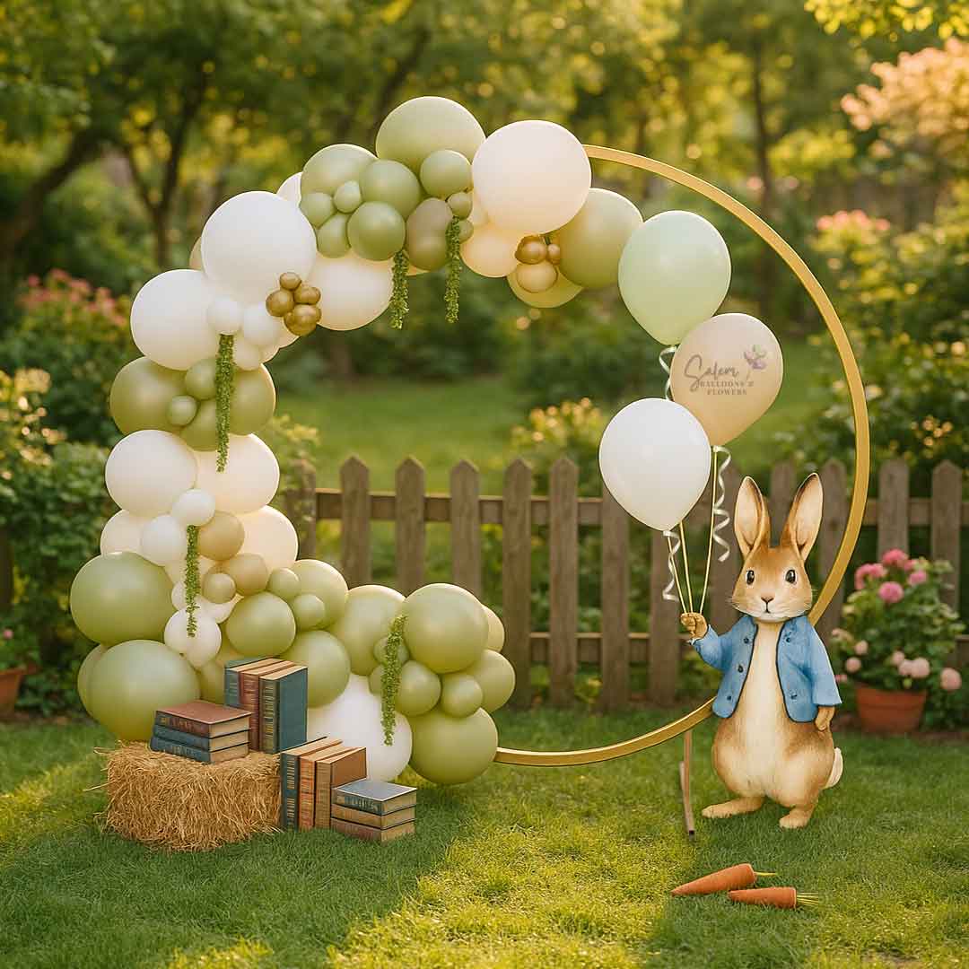 Decorative balloon hoop with a rabbit figure holding a balloon in a garden setting. Balloon decor Oregon.