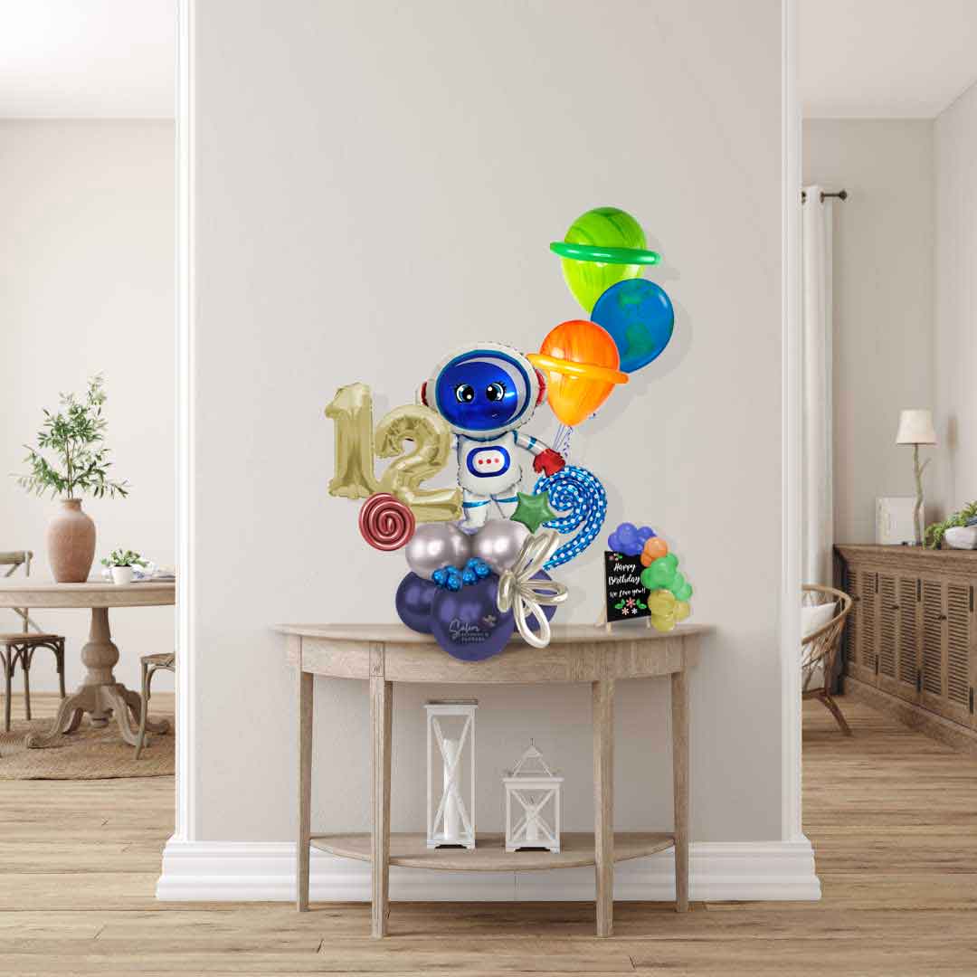 Astronaut themed balloon bouquet with number balloons, stars, curly balloons and ribbon and a set of planet themed helium balloons. Balloons Salem Oregon. Size Chart.
