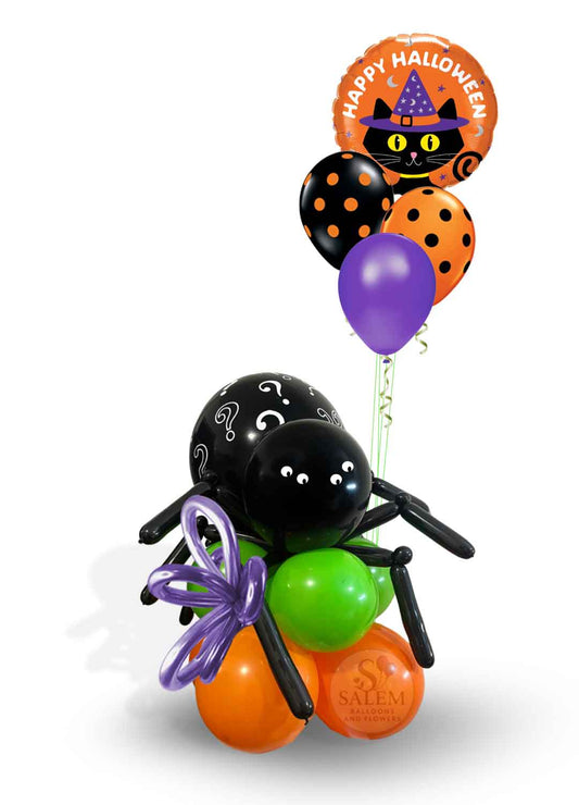 Halloween-themed balloon arrangement on white background, in purple, orange, green, and black. Halloween balloon gift. Oregon.